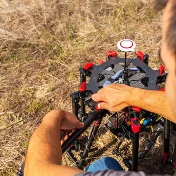 The process of setting up a copter before flight. Stock Photos