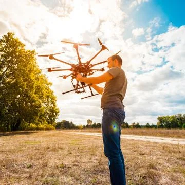 The process of setting up a copter before flight. Stock Photos