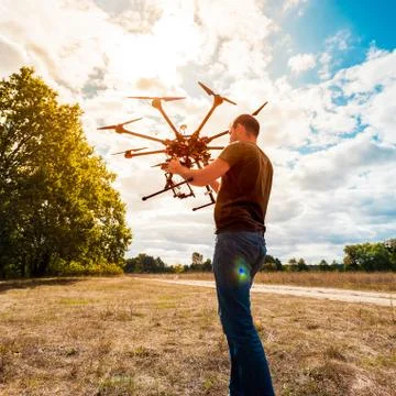 The process of setting up a copter before flight. Stock Photos