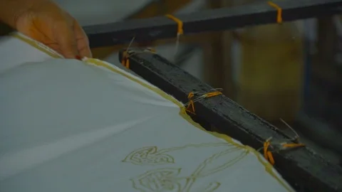 Process of setting up the fabric before painting  in Batik factory Penang Stock Footage 108797474