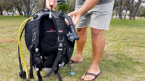 The process of setting up scuba diving equipment Stock Footage 107172764