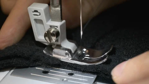 The process of sewing black woolen fabric on the sewing machine Video stock 114622779