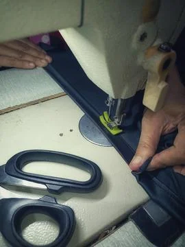 The process of sewing clothes. Stock Photos