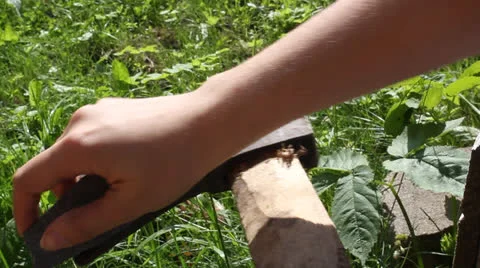 The process of sharpening the ax 3 Stock Footage 24739147
