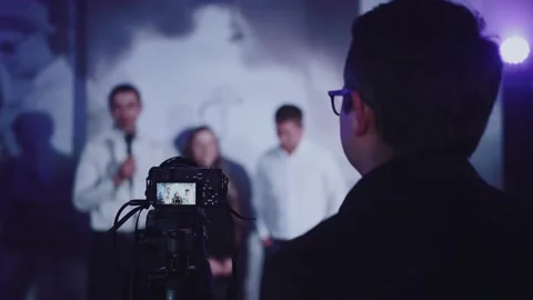 The process of shooting an interview at the event Stock Footage 169040116