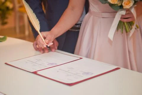 The process of signing an important document with a pen 1782. Stock Photos