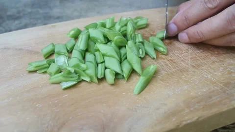 The process of slicing beans Stock Footage 247901875