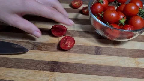 Process Of Slicing Cherry Tomatoes Stock Footage 160674946