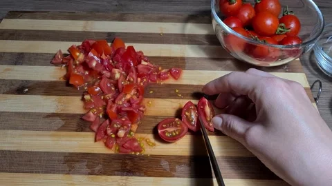 Process Of Slicing Cherry Tomatoes Vídeo Stock 160674960