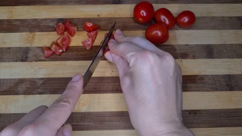 Process Of Slicing Cherry Tomatoes Stock Footage 165542656