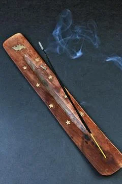 The process of smoldering incense sticks Stock Photos