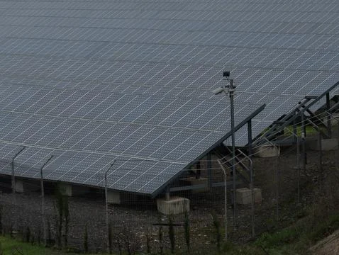 The process of Solar Panel Installation in a Secure Facility for renewable .. Stock Photos