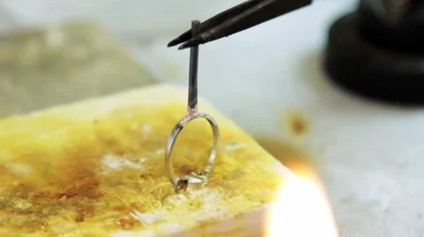 Process of soldering gold ring by torch. Stock Footage 59297244
