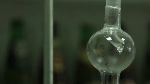 The process of solution boiling in a flask in a chemical laboratory. Stock Footage 75607776