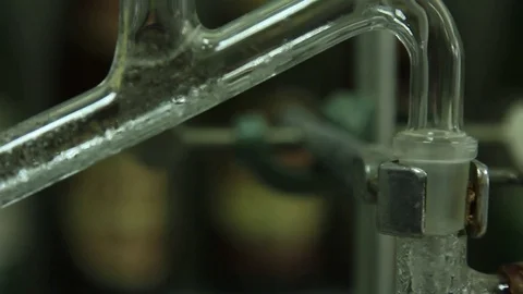 The process of solution boiling in a flask in a chemical laboratory. Stock Footage 75607794