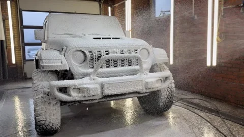 Process of spraying foam on the auto body in the station. Stock Footage 322772678