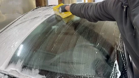 Process of spraying foam on the auto body in the station. Stock Footage 329798958