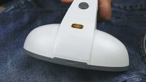 Process of steaming of clothes using steam cleaner Vídeo Stock 70367726