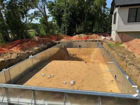 Process of steel structure construction of a swimming pool near house is Stock Photos