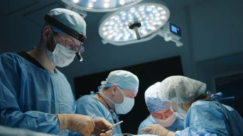 Process of surgeon sewing during plastic operation procedure by young doctor Video stock 239934977