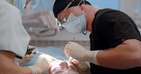 Process of surgery in dental clinic Video stock 277805098