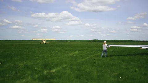 The process of take-off of the airframe, the airplane accelerates the glider Stock Footage 85507702