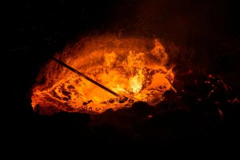 Process of taking a sample of liquid metal in a steelmaking furnace Stock Photos
