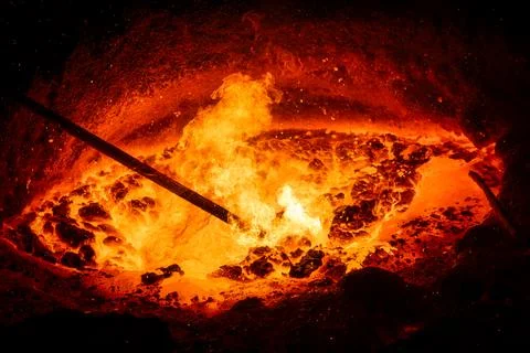Process of taking a sample of liquid metal in a steelmaking furnace Stock Photos