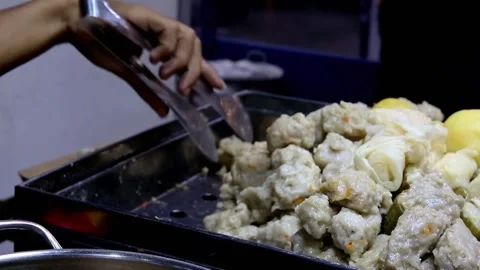 The process of taking the somay at the somay steaming place Stock Footage 270347760
