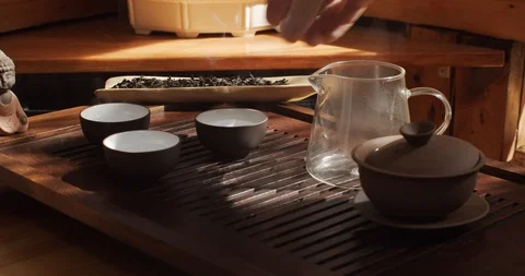 Process of tea ceremony indoors close up natural sunlight slow motion 4k. Stock Footage 116624025
