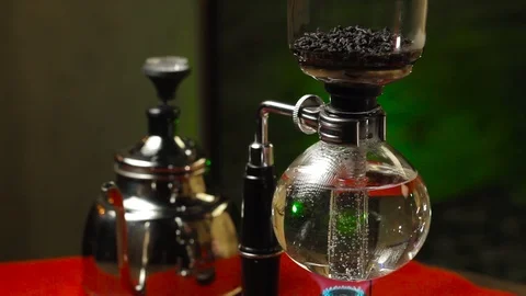 The process of tea in the siphon traditions of Asia Stock Footage 105604108