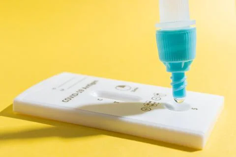 Process of testing with rapid antigen test kit for viral disease COVID-19 on  Stock Photos
