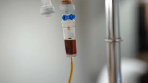 Process Of Therapy For Patient Lying On Bed In Hospital Room 4k Slow Motion Stock Footage 180299597