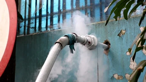 The process of transferring liquid oxygen from a delivery truck Stock Footage 182210927