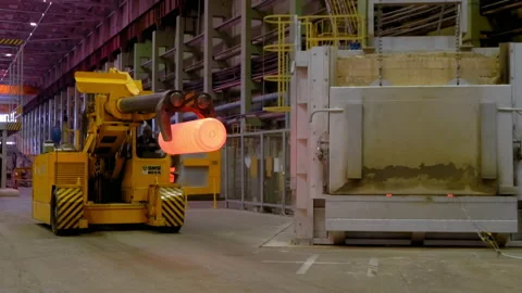 Process of transportation of metal hot workpiece at mechanical plant. Stock Footage 160629345