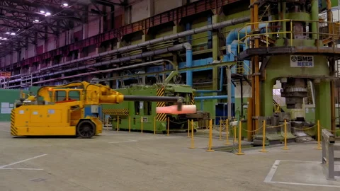 Process of transportation of metal hot workpiece at mechanical plant. Stock Footage 160630552