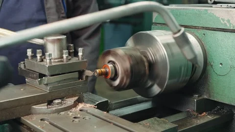 The process of turning a part on a grinding machine or lathe Stock Footage 284544162