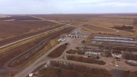 The process of unloading sugar beets. Heap of licorice. The movement of trucks Stock Footage 170512479