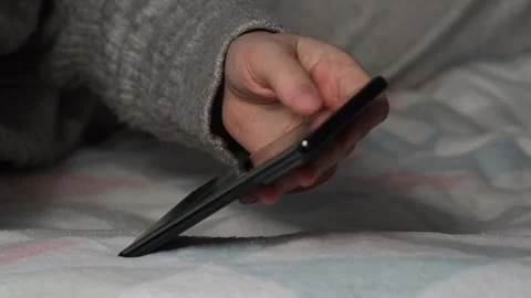 The process of using a smartphone. Close-up of a girl's hands. Stock Footage 225839955