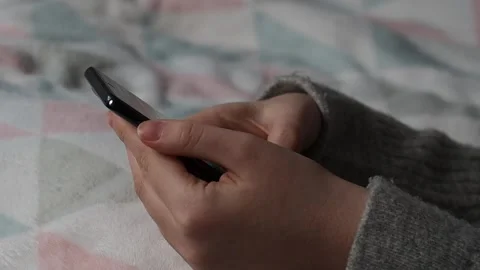 The process of using a smartphone. Close-up of a girl's hands. Stock Footage 225839960