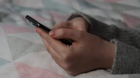 The process of using a smartphone. Close-up of a girl's hands. Stock Footage 225839963