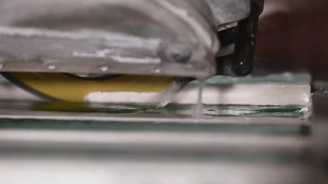 The process washed down the seam of porcelain tiles at forty-five degrees. A Stock Footage 240903136