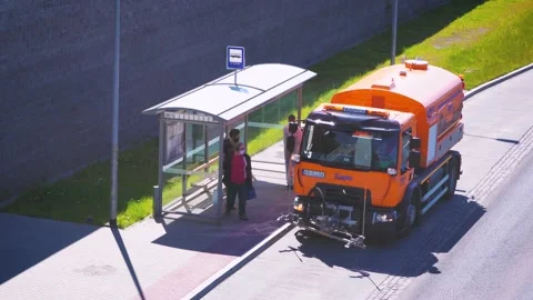 Process of washing and disinfecting a public transport stop during the COVID-19  Video stock 130862068