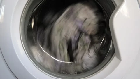 The process of washing laundry in a siral machine. Stock Footage 275571513