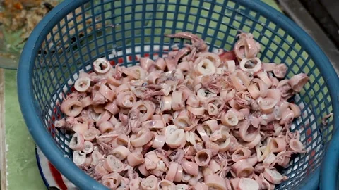 The process of washing squid meat to make fried chili sauce. Stock Footage 276148678