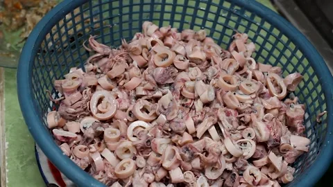 The process of washing squid meat to make fried chili sauce. Stock Footage 276150005