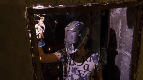 A process of welding in a old building underground Stockfoto's
