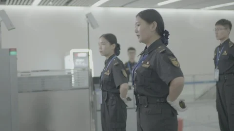 The process by which subway security personnel check passengers. Stock Footage 125480459