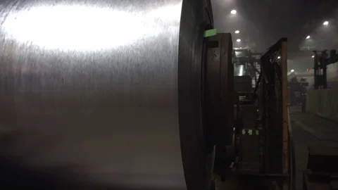 The process of winding into rolls the sheet metal after lead plating. Video stock 84719853