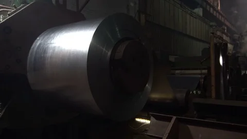 The process of winding into rolls the sheet metal after lead plating. Stock Footage 84719948
